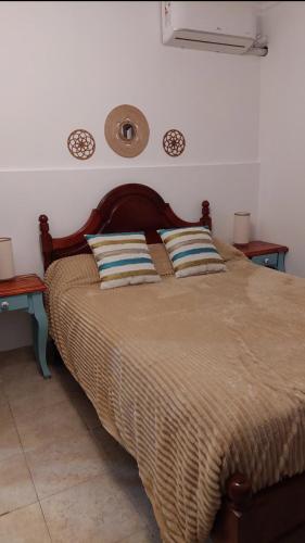 Posteľ alebo postele v izbe v ubytovaní Departamentos Tegragoma