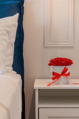 Ένα ή περισσότερα κρεβάτια σε δωμάτιο στο Melena Premium Suites