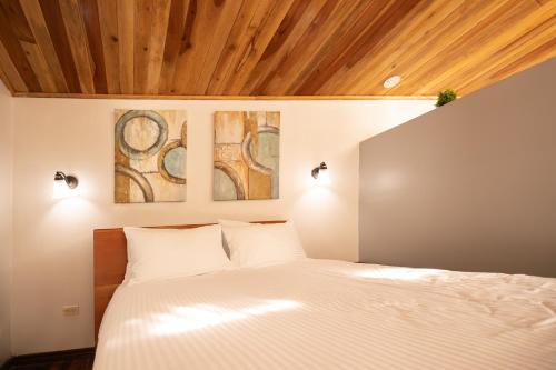 Katil atau katil-katil dalam bilik di Gamaí Monteverde Tiny House