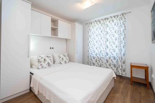 Krevet ili kreveti u jedinici u okviru objekta Apartments Malic