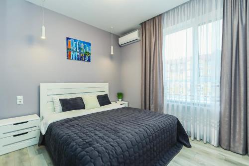 Ένα ή περισσότερα κρεβάτια σε δωμάτιο στο Premium apartment on Belvedere