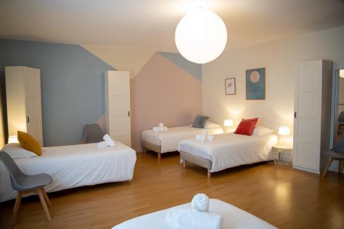 Katil atau katil-katil dalam bilik di Chambre d'hôte au Domaine de vizols