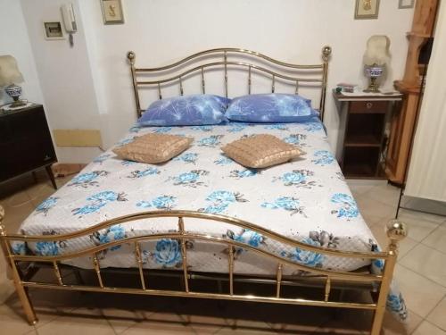 Katil atau katil-katil dalam bilik di Villa Felicità, relax e servizi al top
