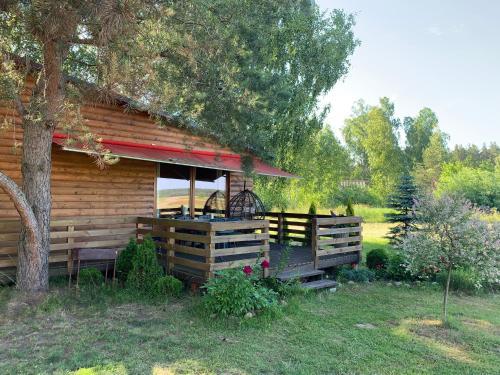 Сад в Pociunai relax house