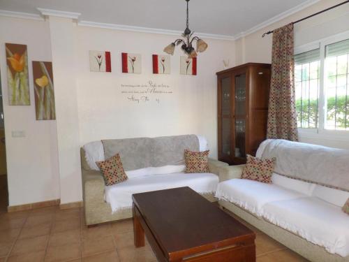 Posezení v ubytování DUPLEX AL ANDALUS THALASSA