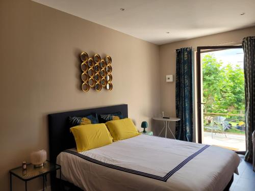 Postel nebo postele na pokoji v ubytování Mas Tareau la Goyaw