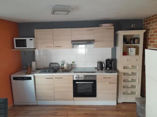Kuchyň nebo kuchyňský kout v ubytování Ferienwohnung Gisela