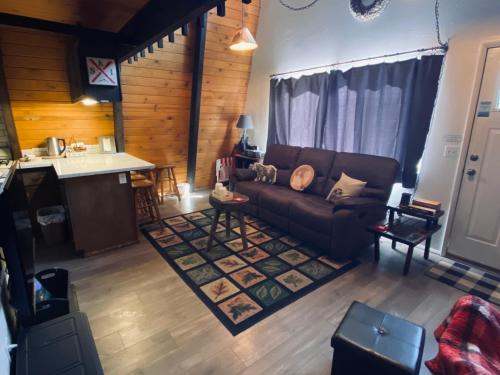 an overhead view of a living room with a couch at Bills Big Bear Bunkhouse - Beautiful home within a short drive to all Big Bear has to offer! in Big Bear City