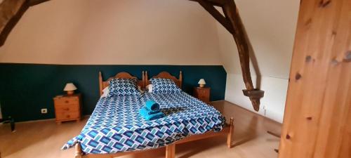 Postel nebo postele na pokoji v ubytování Grange Périgourdine - Piscine Privative