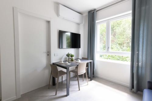 Televisyen dan/atau pusat hiburan di Residence Locatelli