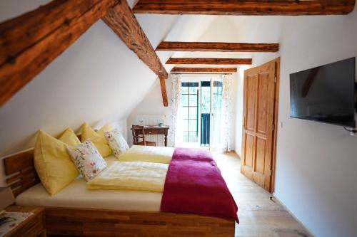 Postel nebo postele na pokoji v ubytování Ferienhaus KAUSCHLERHOF