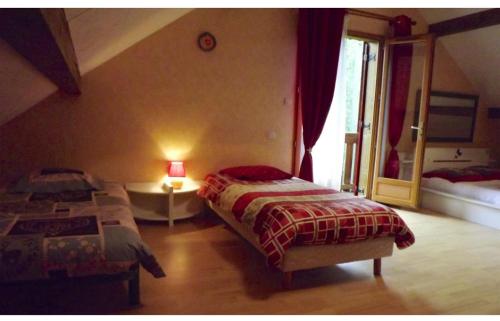 Una cama o camas en una habitación de Le Haut Van