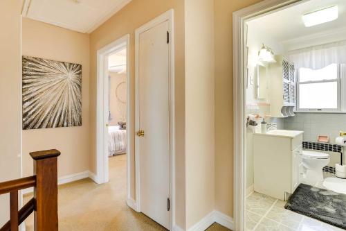 a bathroom with a toilet and a sink at Wilmington Vacation Rental Near River and Downtown! in Wilmington