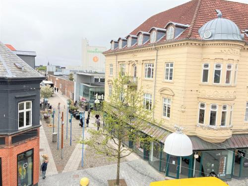 a view of a street in a city with buildings at One Bedroom Apartment In Esbjerg, Smedegade 19 in Esbjerg