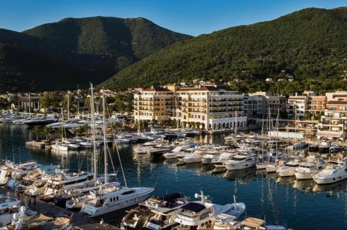 a bunch of boats are docked in a harbor at Porto Montenegro - Residence Tara in Tivat