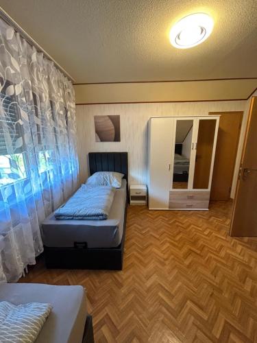Erbach Ferienwohnung tesisinde bir odada yatak veya yataklar