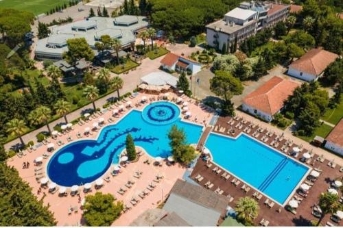 an aerial view of a resort with a swimming pool at Durres Apartment Panoramic Sea in Durrës