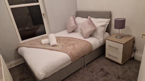 Een bed of bedden in een kamer bij Thorpe Place