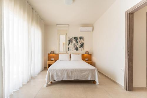 Postel nebo postele na pokoji v ubytování Kalisun Exclusive Villas