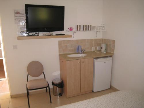Kuchyň nebo kuchyňský kout v ubytování Gil's Guest Rooms