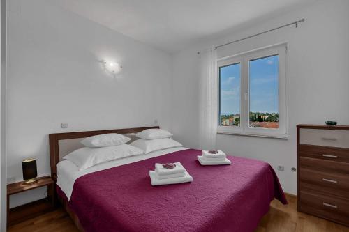 Posteľ alebo postele v izbe v ubytovaní Urban Apartment