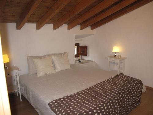 Katil atau katil-katil dalam bilik di Casa do Castelo - Torre