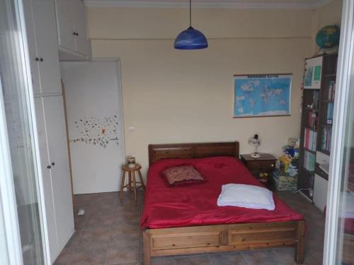 Een bed of bedden in een kamer bij Blue and white apartments 3