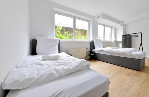 Postel nebo postele na pokoji v ubytování Stay and Work Apartment - 8 beds - 4 bed rooms