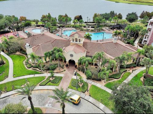 an aerial view of a house with a swimming pool at Executive 3 Bedroom Villa at Universal,Convention Center, Vista Cay in Orlando