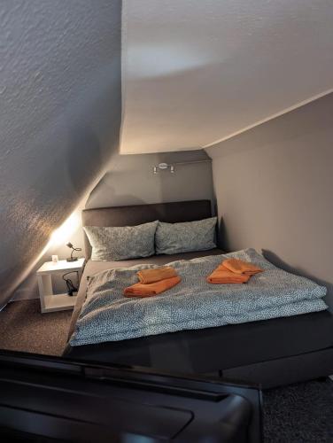 מיטה או מיטות בחדר ב-Flensburg Zentrum 10 HH 1OG ML