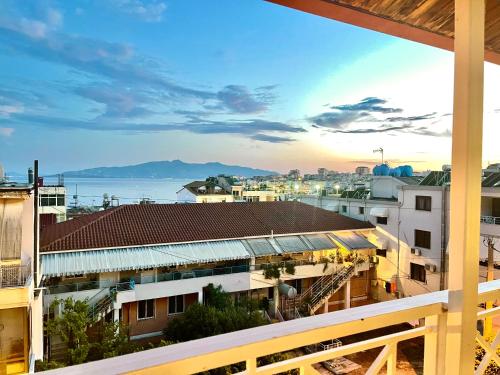 a view of the city from the balcony of a building at Hotel Aulona in Sarandë