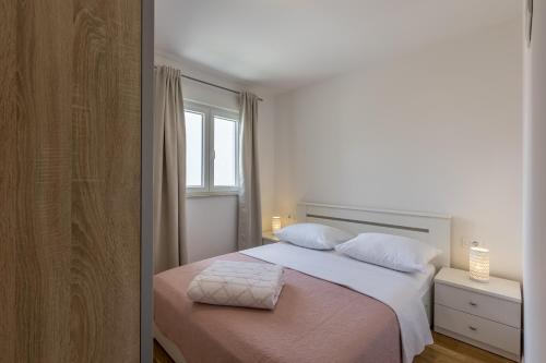 Кровать или кровати в номере Apartment Tadic