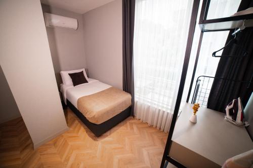 Cama o camas de una habitación en Moon Suites