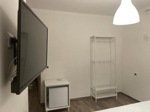 TV a/nebo společenská místnost v ubytování A casa di NENÉ