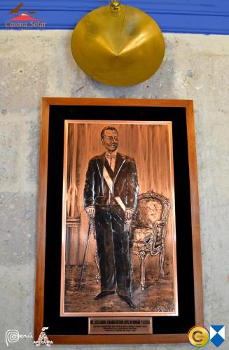 a painting of a man with a cane in a chair at Hotel Casona Solar in Arequipa