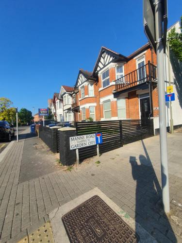 a street sign in front of a building at Marble House in Edgware