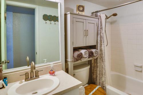 a bathroom with a sink and a toilet and a shower at Ocean Jewels Resort Studio with Community Perks! in Daytona Beach