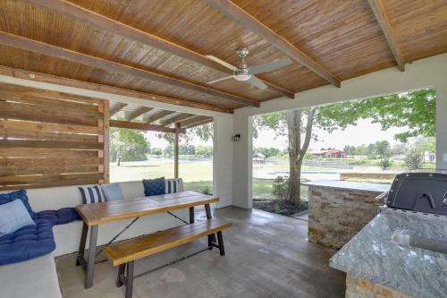 a patio with a couch and a table and a grill at Private Pool and Guest House Spacious Kemp Home! in Kemp