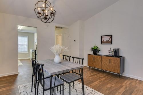 a dining room with a table and chairs at Serene Sanctuary Near I-20 in Augusta