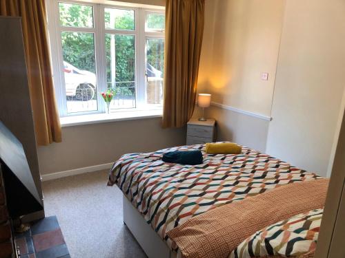 Ένα ή περισσότερα κρεβάτια σε δωμάτιο στο The Burnham House