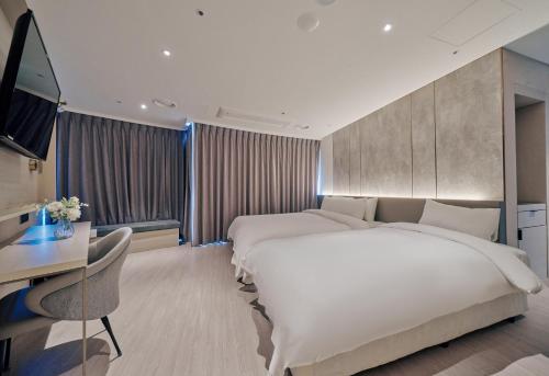 Ένα ή περισσότερα κρεβάτια σε δωμάτιο στο Hotel Aqua Palace