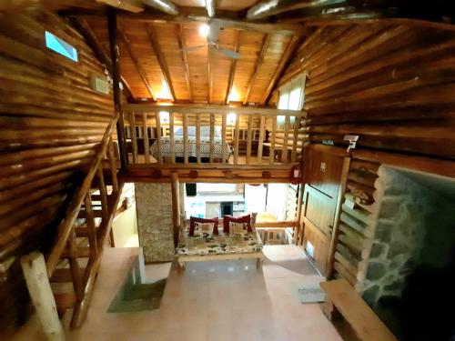 an overhead view of a room in a log cabin at Cabaña Suiza in Cacheuta