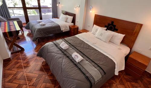 Katil atau katil-katil dalam bilik di QUECHUA´S HOUSE Hostal & Coffee