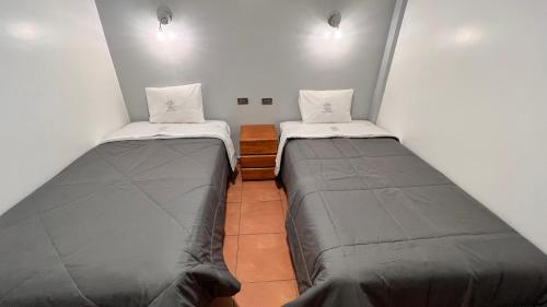 Katil atau katil-katil dalam bilik di QUECHUA´S HOUSE Hostal & Coffee