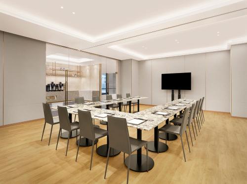 a conference room with a long table and chairs at Four Points by Sheraton Seoul, Guro in Seoul