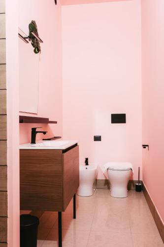 a bathroom with a sink and a toilet at Le Camere ai Trabocchi in Vasto