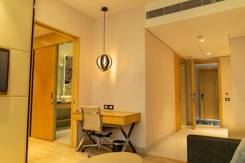 TV a/nebo společenská místnost v ubytování BEYZAA HOTEL AND SUITES