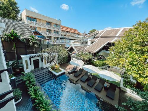 an aerial view of a hotel with a swimming pool at Thai Akara - Lanna Boutique Hotel in Chiang Mai