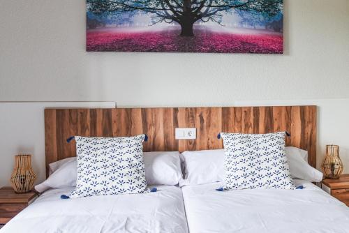 Postel nebo postele na pokoji v ubytování La Lombana