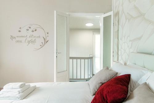Letto o letti in una camera di La Casa della Bruna, wonderful lake view & parking